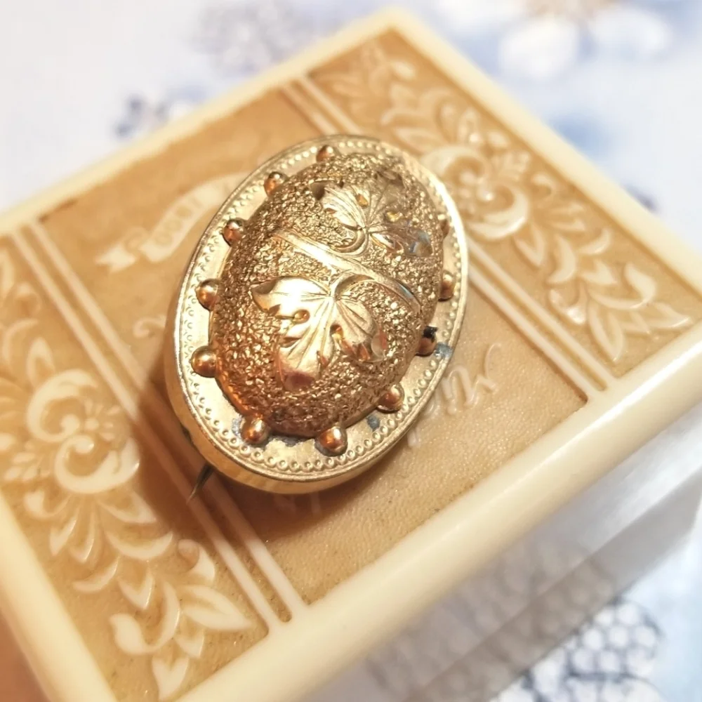 1870s Victorian Era Gold Filled Reppousse Brooch